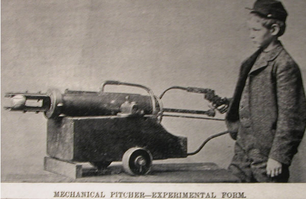 Who invented the first pitching machine?